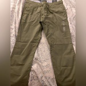 Green Tommy Hilfiger chinos. Slim fit, size 26x30. Never worn, tags still on!